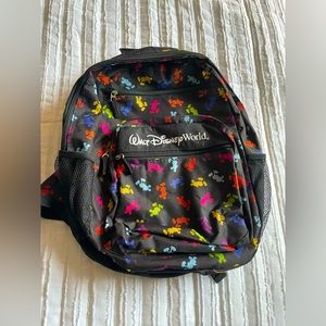 Black and colorful Mickey print book bag.